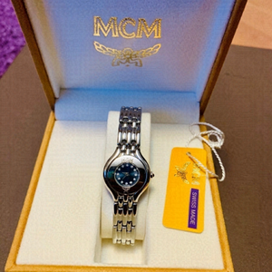 authentic MCM ladies watch in silver tone